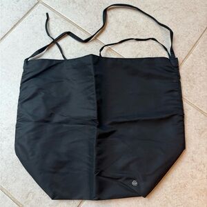 The row - Black Tote Bag